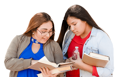 indigenous teens looking at books